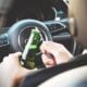 Photo by energepic.com: https://www.pexels.com/photo/person-opening-bottle-on-car-288476/