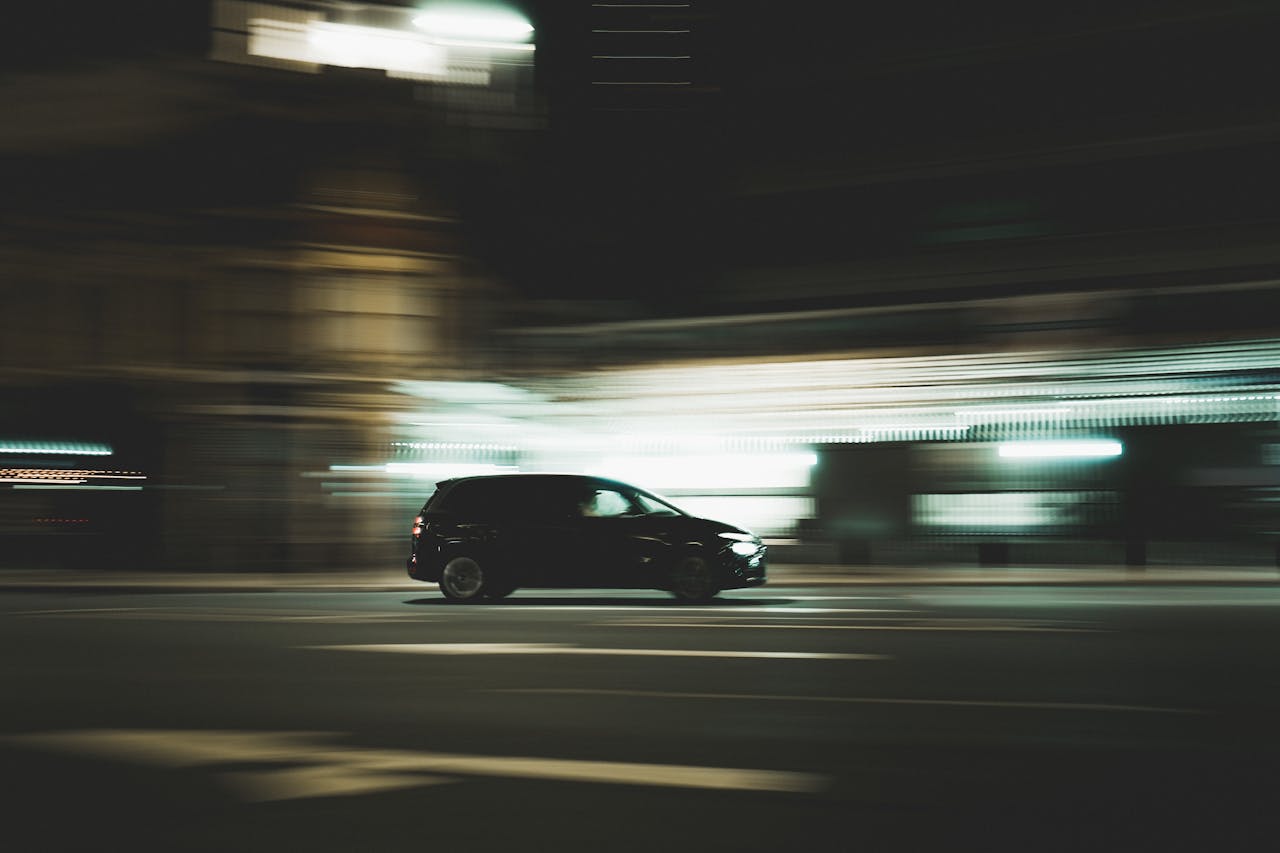 Photo by Vitor Lopes: https://www.pexels.com/photo/black-car-on-the-road-during-nighttime-15121199/